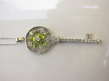 PERIDOT PEAR SHAPE AND DIAMOND ROUND BRILLIANT KEY PENDANT