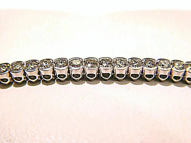 61 ROUND BRILLIANT CUT DIAMONDS HALF BEZEL SET DIAMOND