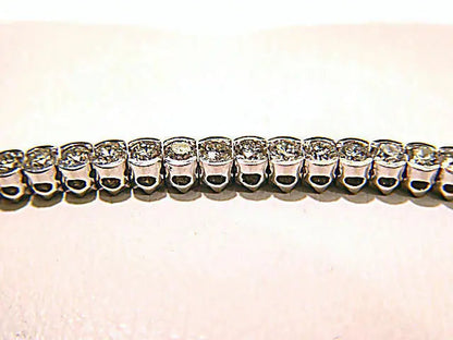 61 ROUND BRILLIANT CUT DIAMONDS HALF BEZEL SET DIAMOND