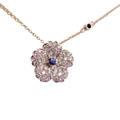 DIAMOND FLOWER PENDANT .90 CT AND BLUE SAPPHIRE .13 CT