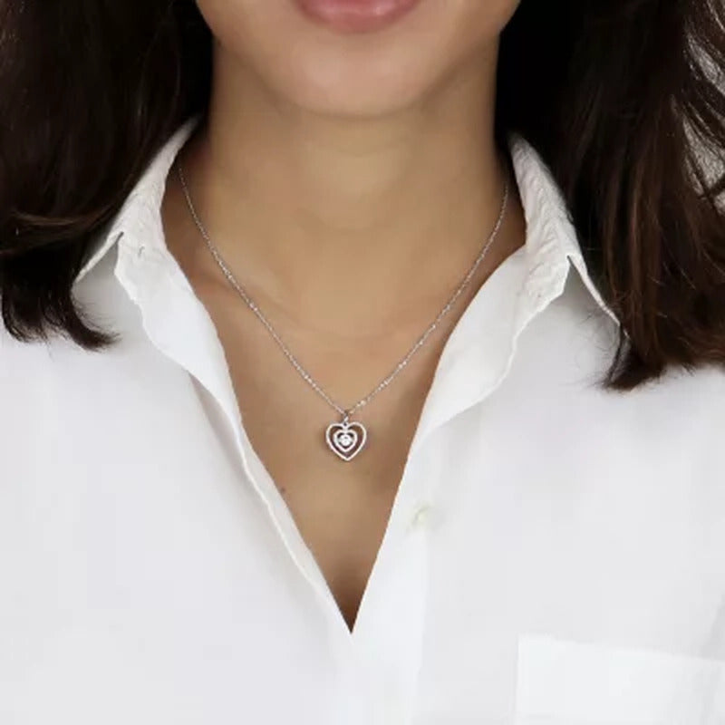 Sterling Silver Dancing Lab Created White Sapphire and 0.14 CT. T.W. Diamond Hea