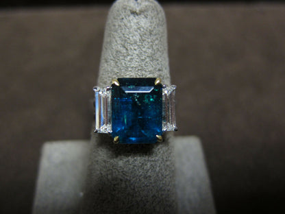 rectangular emerald 4.00 cttw diamond two emerald shape side diamond set ring