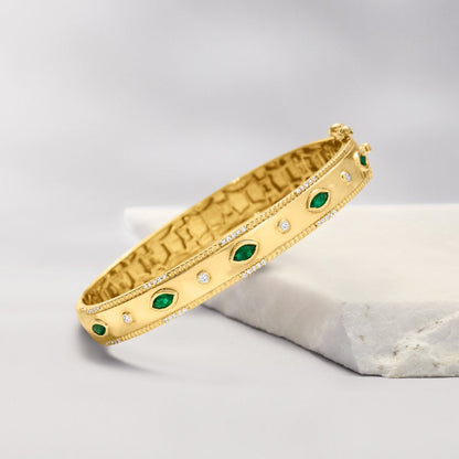 0.80 Ct. T.W. Emerald and .26 Ct. T.W. Diamond Bangle Bracelet in 18Kt Gold over