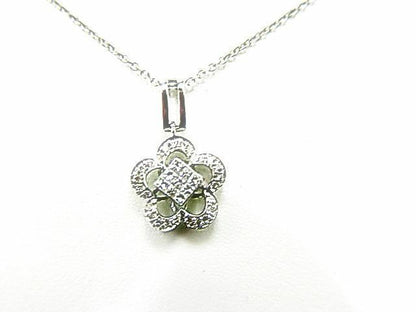 DIAMOND ROUND BRILLIANT SHAPE PRINCESS SHAPE FLUERETTE .31 CT G VS1/2 18 K GOLD