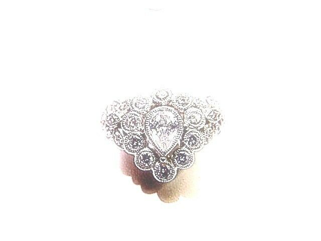 CENTER PEAR CUT DIAMOND SIDE ROUND BRILLIANT CUT DIAMOND COCKTAIL RING BAND