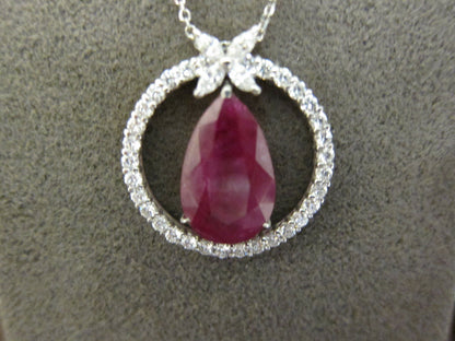RUBY PEAR SHAPE PENDANT SET WITH ROUND DIAMOND FOUR MARQUISE SHAPE SET AROUND