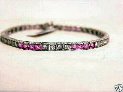 24 SQUARE CUT PINK SAPPHIRE 6.86 CTTW AND 24 ROUND BRILLIANT SHAPE