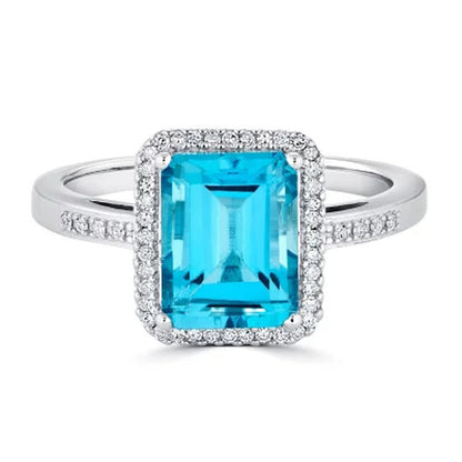 Blue Topaz and 0.14 CT. T.W. Diamond Ring in Sterling Silver