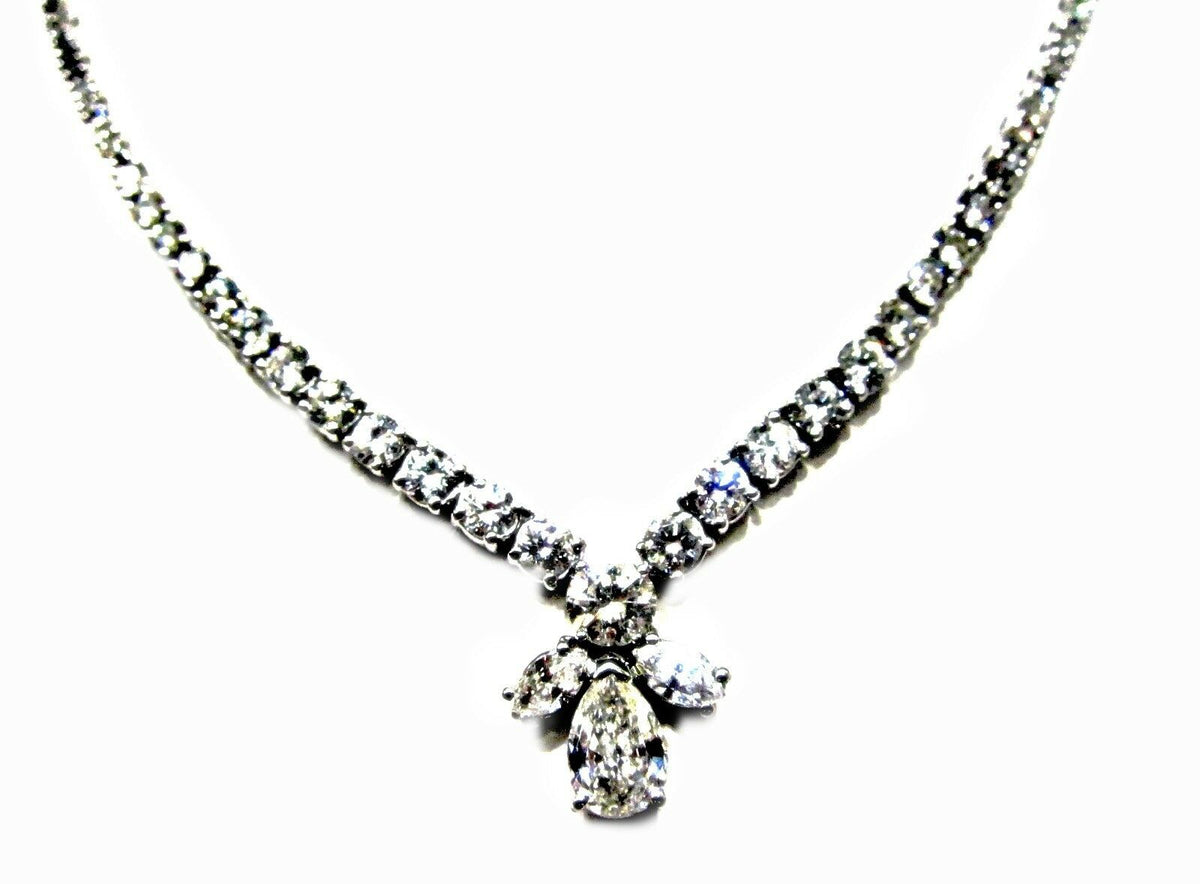 GIA CERTIFIED PEAR BRILLIANT SHAPE H SI1 SET WITH TWO