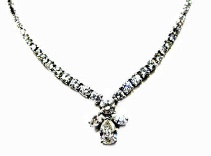 GIA CERTIFIED PEAR BRILLIANT SHAPE H SI1 SET WITH TWO