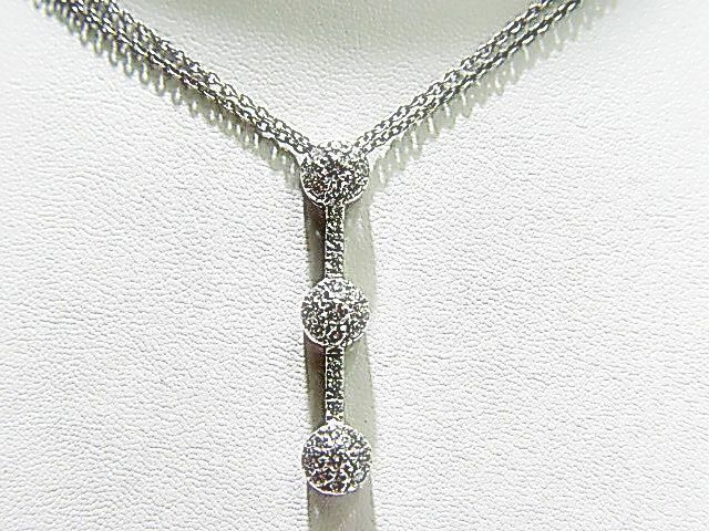 .56 CT DIAMOND ROUND BR SHAPE PRONG SET PENDANT
