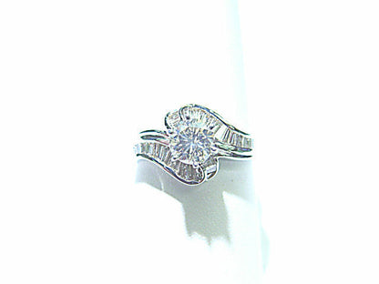 ROUND BRILLIANT SHAPE BAGUETTE SHAPE DIAMOND RING