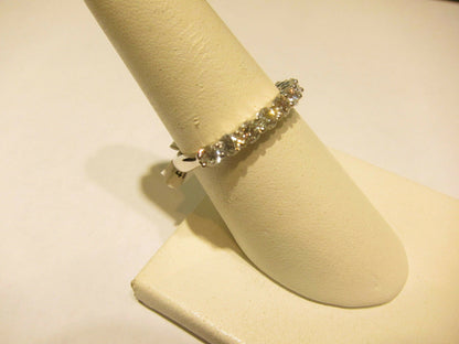 DIAMOND ELEVEN ROUND BRILLIANT COMMON PRONG SET THIN BAND