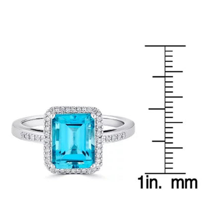 Blue Topaz and 0.14 CT. T.W. Diamond Ring in Sterling Silver