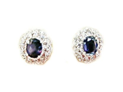 TWO SAPPHIRE OVAL SHAPE SET TWO ROW ROUND DIAMOND SET