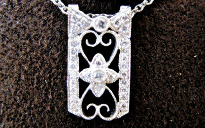 BOW HEART AND FLOWER PENDANT INCLUDED CHAIN