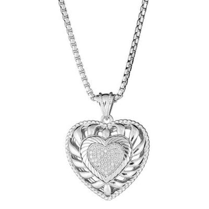 0.24 CT. T.W. Diamond Puffed Heart Pendant in Sterling Silver, Adjustable to 25"