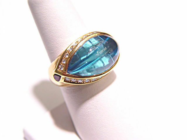 BLUE TOPAZ CABOCHON 12.30 CT ROUND BRILLIANT CUT DIAMOND .48 CT 2 RUBIES .20 CT