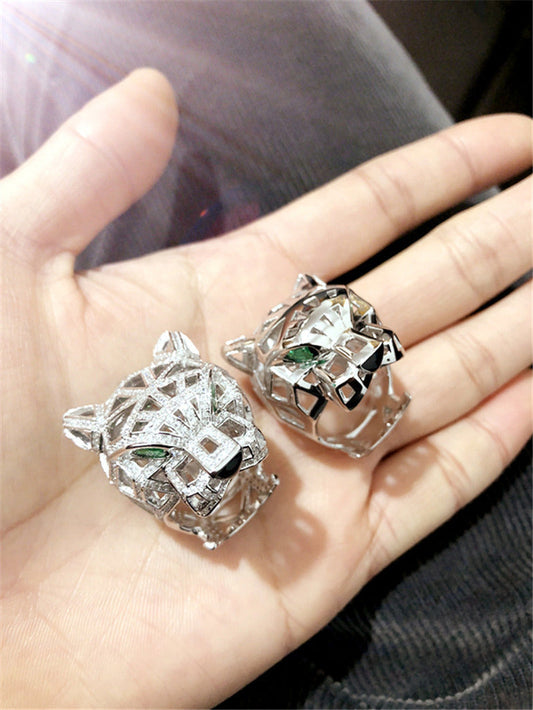 Silver Ring with Diamond-Free Gold and Green Eyes and Emeralds