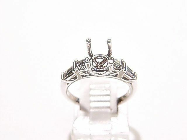 DIAMOND 2 ROUND BR 2 BAGUETTE SHAPE SETTING 4 PRONG DIAMOND SETTING DIAMOND RING