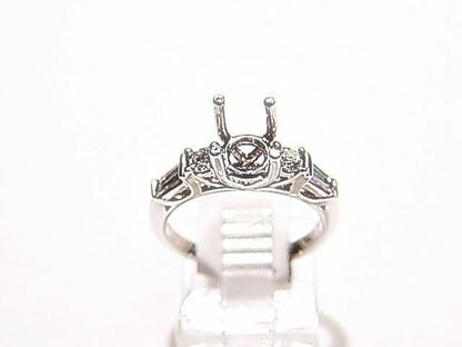 DIAMOND 2 ROUND BR 2 BAGUETTE SHAPE SETTING 4 PRONG DIAMOND SETTING DIAMOND RING