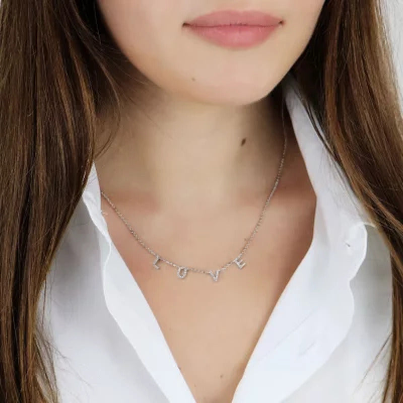 0.15 CT. T.W. Diamond LOVE Necklace in Sterling Silver