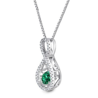Dancing Lab Created Emerald and 0.12 CT. T.W. Diamond Infinity Pendant in Sterli