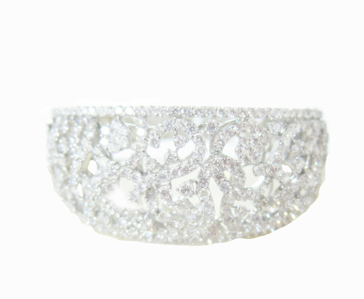 DIAMOND ROUND BRILLIANT FLOWER SWIRL BANGLE TOP GRADUATED TO BOTTOM