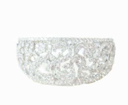 DIAMOND ROUND BRILLIANT FLOWER SWIRL BANGLE TOP GRADUATED TO BOTTOM