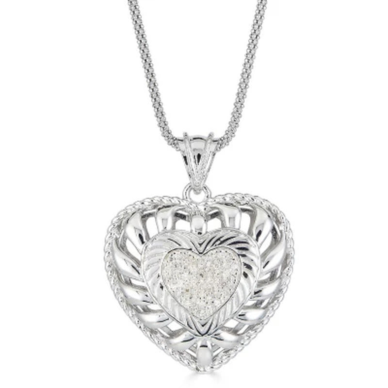 0.24 CT. T.W. Diamond Puffed Heart Pendant in Sterling Silver, Adjustable to 25"