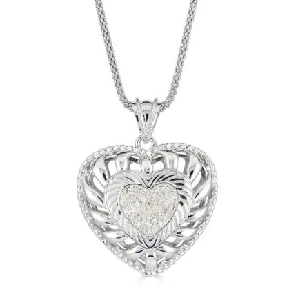 0.24 CT. T.W. Diamond Puffed Heart Pendant in Sterling Silver, Adjustable to 25"
