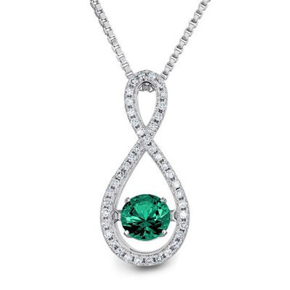Dancing Lab Created Emerald and 0.12 CT. T.W. Diamond Infinity Pendant in Sterli