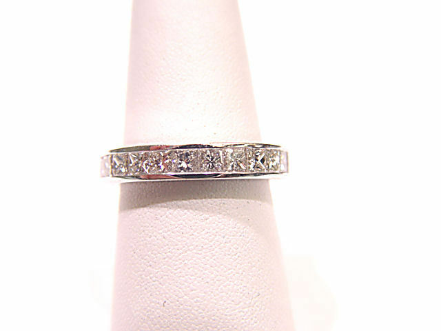 DIAMONDS ARE SET ALL THE WAY AROUND THE BAND ETERNITY
