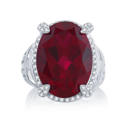 Sterling Silver with Large Oval Ruby and Natural White Topaz Halo Cocktail Ring