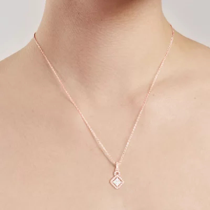 0.23 CT. T.W. Marquise and round Kite-Shape Dangle Pendant in 14K Gold