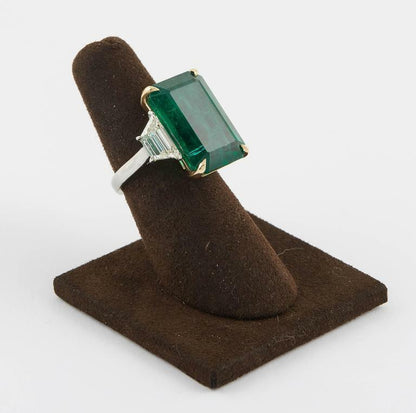 GIA certified 18.83 carat emerald set along 2.08 carat of side diamonds