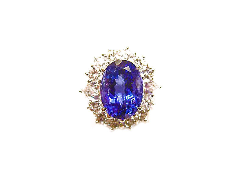 3.78 CT TANZANITE OVAL OVAL CUT SET WITH 12 ROUND BRILLIANT CUT DIAMONDS 18 K