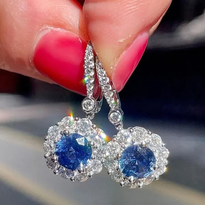 Exquisite and Fashion Silver Plated Blue Sapphire Pendant Lab Diamond Flower Hanging Earrings for Women Bridal Wedding Earrings