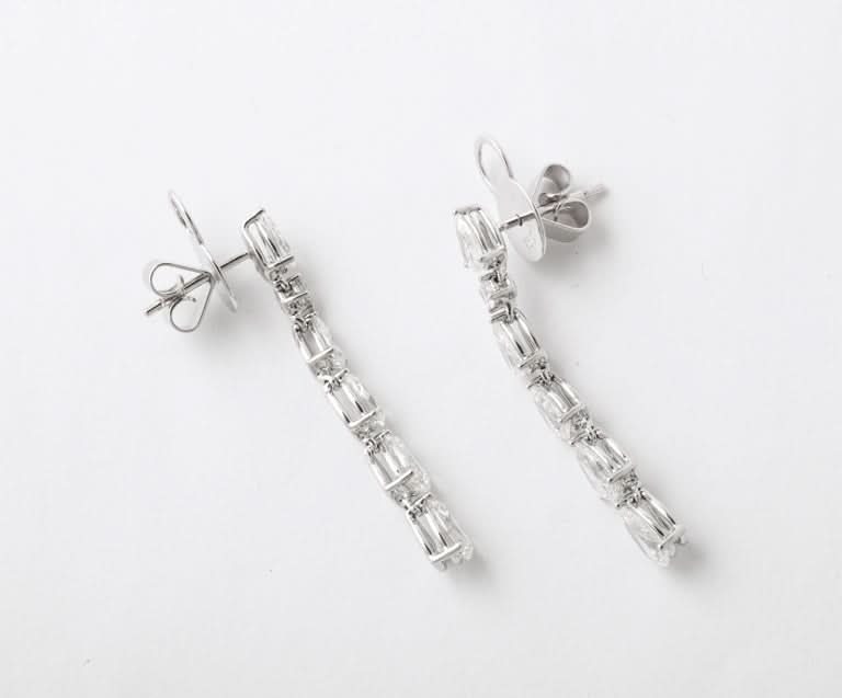 Exquisite 18k White Gold 4.06 Carat Pear Diamond Dangle Earrings