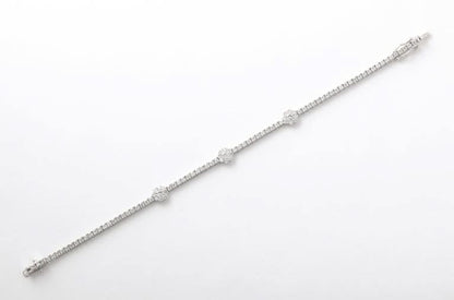 https://a.1stdibscdn.com/flower-diamond-tennis-bracelet-for-sale-picture-3/j_415/j_216140721705596565196/6R1A0162_master.jpg?width=768