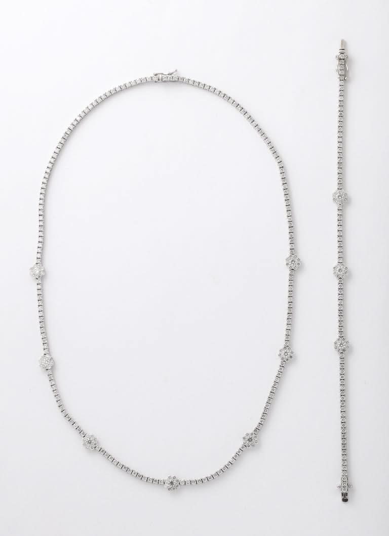 https://a.1stdibscdn.com/flower-diamond-tennis-necklace-for-sale-picture-6/j_415/j_216141721705596939245/6R1A0183_master.jpg?width=768