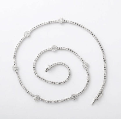 https://a.1stdibscdn.com/flower-diamond-tennis-necklace-for-sale-picture-4/j_415/j_216141721705596939551/6R1A0180_master.jpg?width=768
