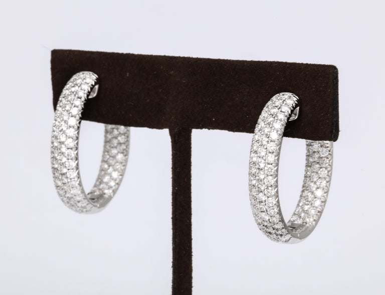 https://a.1stdibscdn.com/pave-diamond-oval-hoop-earrings-for-sale-picture-5/j_415/j_124611321622815537421/6R1A0527_master.jpg?width=768