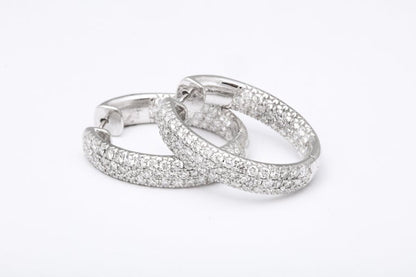 https://a.1stdibscdn.com/pave-diamond-oval-hoop-earrings-for-sale-picture-3/j_415/j_124611321622815541611/6R1A0529_master.jpg?width=768