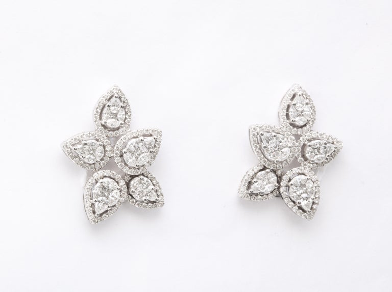 https://a.1stdibscdn.com/diamond-cluster-earrings-for-sale-picture-3/j_415/j_140275121637953079768/6R1A1265_master.jpg?width=768