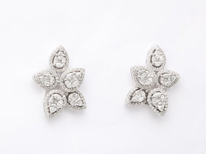 https://a.1stdibscdn.com/diamond-cluster-earrings-for-sale-picture-3/j_415/j_140275121637953079768/6R1A1265_master.jpg?width=768