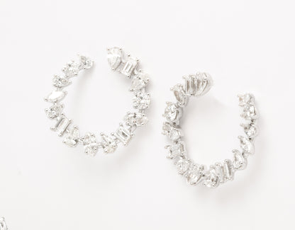 https://a.1stdibscdn.com/multi-shape-diamond-swirl-hoop-earrings-for-sale-picture-8/j_415/j_122720721620660228323/6R1A1295_master.jpg
