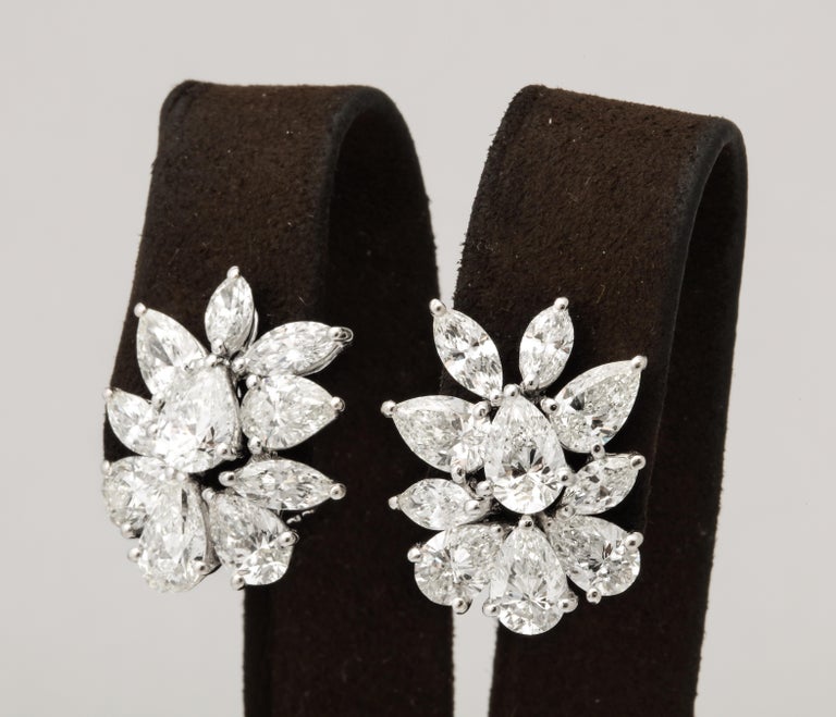 https://a.1stdibscdn.com/diamond-cluster-earrings-for-sale-picture-7/j_415/j_172984621666015948808/6R1A1310_master.jpg?width=768