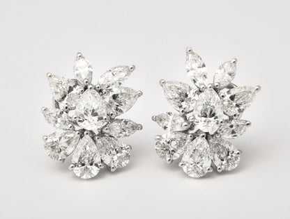 https://a.1stdibscdn.com/diamond-cluster-earrings-for-sale-picture-4/j_415/j_172984621666015948750/6R1A1304_master.jpg?width=768