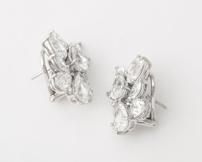 https://a.1stdibscdn.com/diamond-cluster-earrings-for-sale-picture-2/j_415/j_172984621666015948628/6R1A1301_master.jpg?width=768